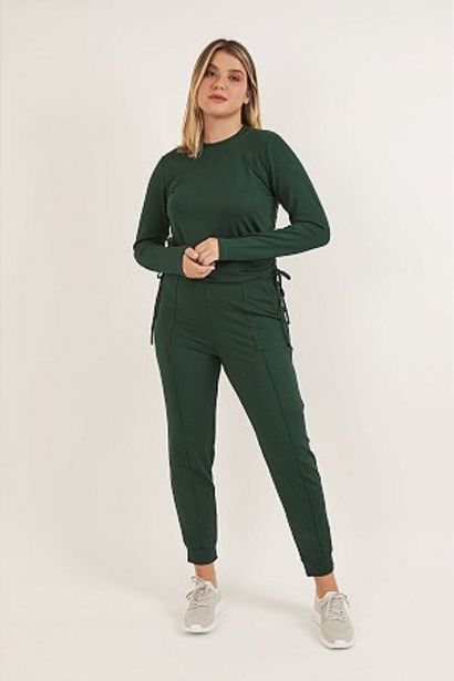 Oferta de Conjunto Cometa verde por R$99,99 em Opção Jeans